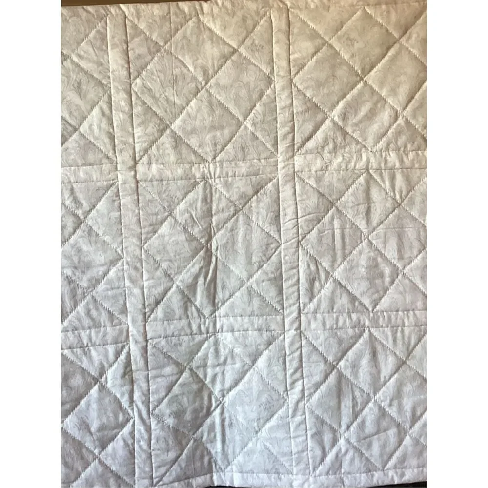 New without tags. Medley of Green Fabrics with White Borders Quilt